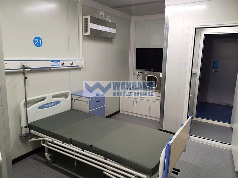 Emergency medical clinic room with hospital bed and medical equipment