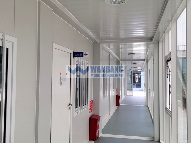 Interior corridor with engineering department sign and safety equipment
