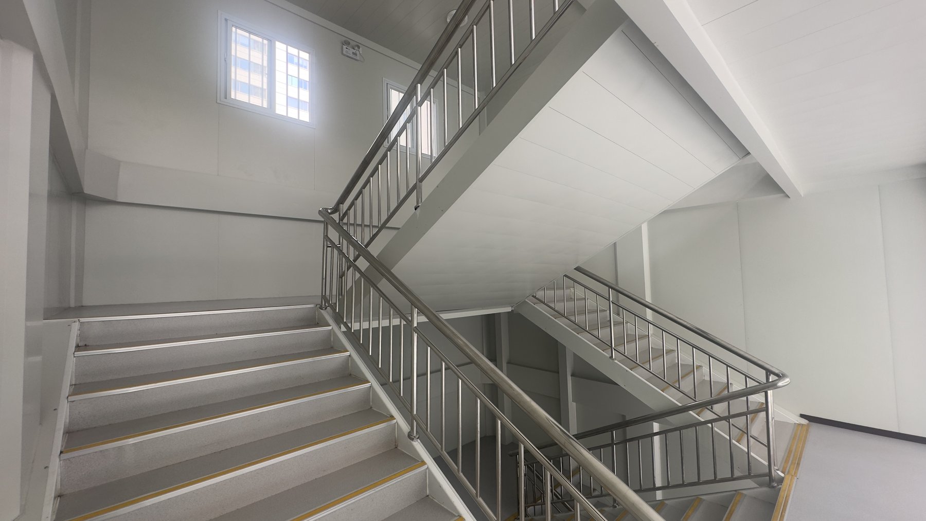 Internal stair core for a three-floor modular office